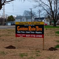 Golden Rule Tire sign beside West US Highway 36